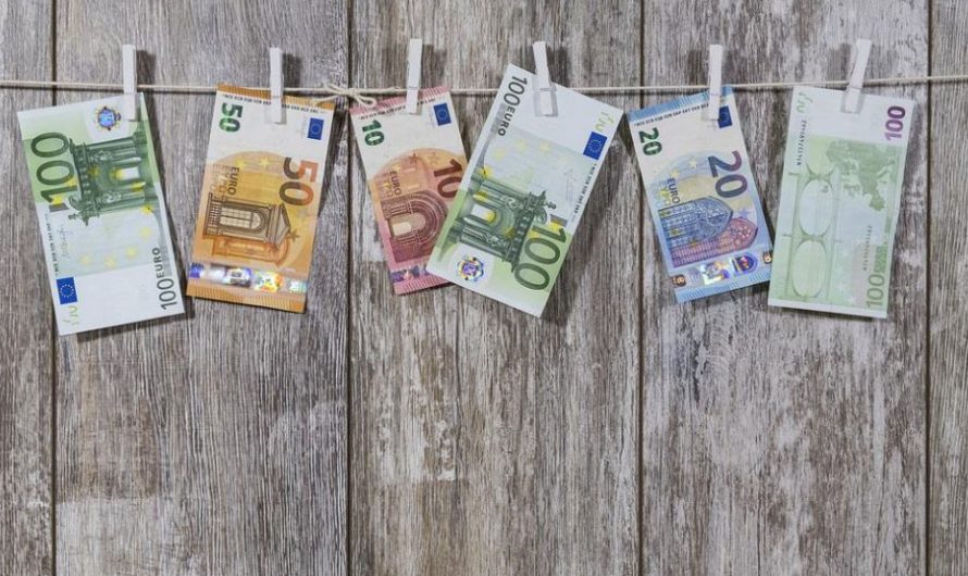 10 Spiritual Meanings of Dreaming of Tearing Money